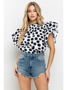 THE SPOTTED TOP-IVORY