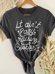 IT AIN'T EASY RAISING COWBOYS